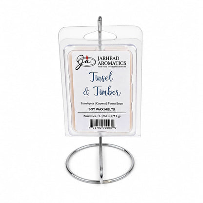 Tinsel & Timber Soy Wax Melt | Fresh Pine Christmas Tree Holiday Scent hanging on a circular metal stand, featuring the holiday fragrance notes of Eucalyptus, Cypress, and Tonka Bean.