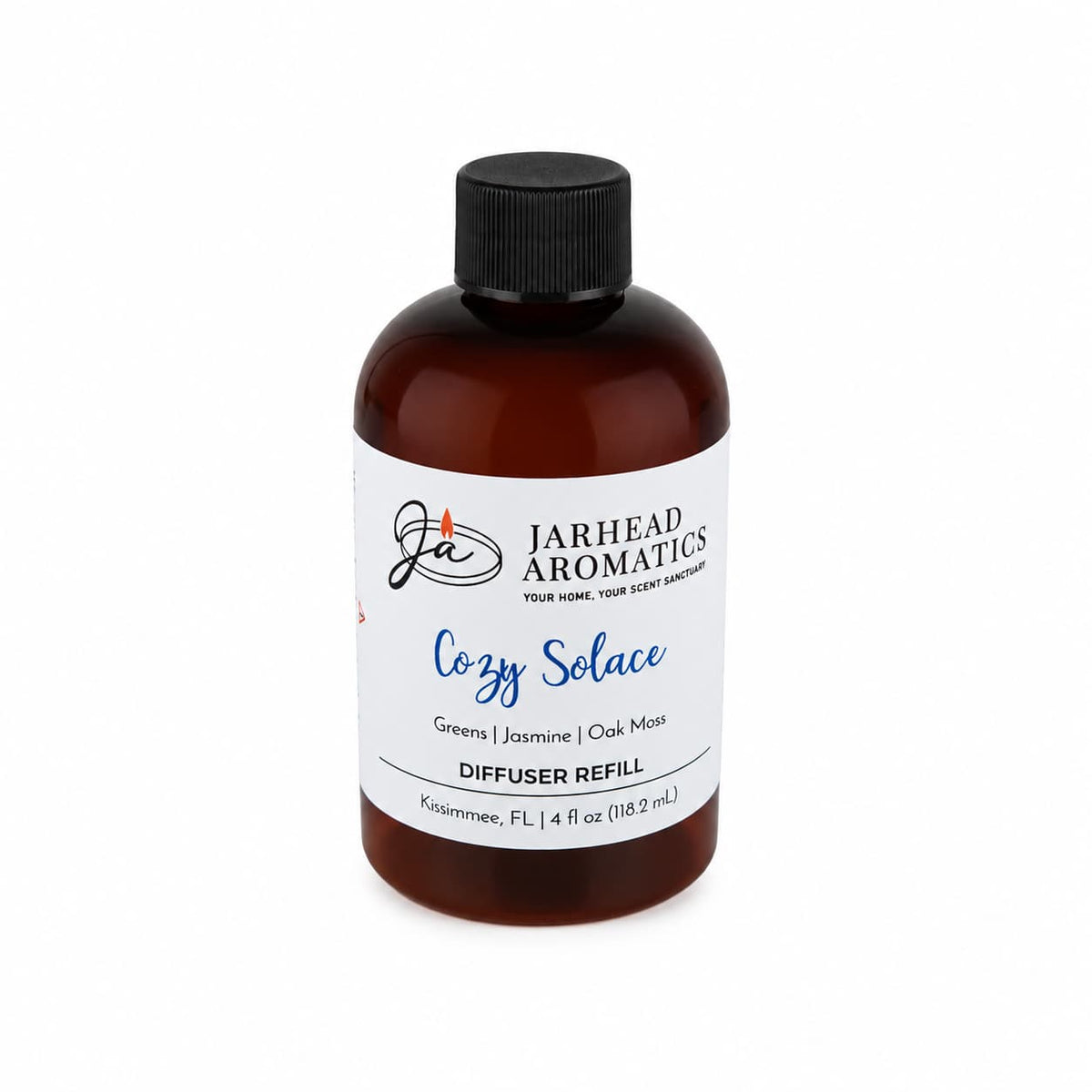 A 4 fl oz brown bottle of Jarhead Aromatics Cozy Solace Diffuser Refill, complete with a black cap, offers an inviting autumn home fragrance with a blend of fresh greens, jasmine, and oak moss.