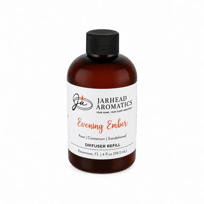 A brown bottle labeled Jarhead Aromatics Evening Ember Diffuser Refill, featuring notes of plum, sandalwood, and soft smoke. The 4 fl oz (118.2 mL) bottle has a black cap and a white label—perfect for adding a warm touch of home fragrance to any space.