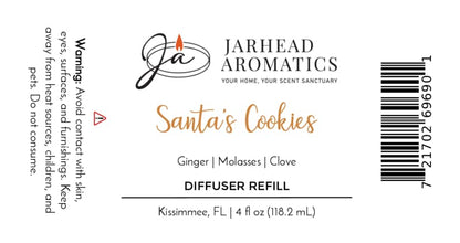 Product label for a Santa’s Cookies Diffuser Refill by Jarhead Aromatics, listing ingredients like ginger, molasses, and clove alongside a warning, volume, and barcode for this holiday home fragrance.