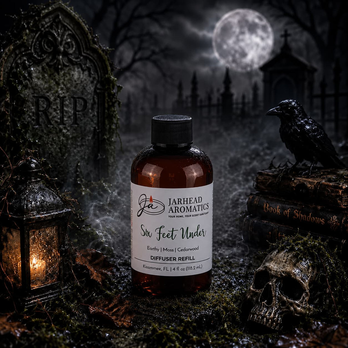 A bottle of Jarhead Aromatics’ Six Feet Under Diffuser Refill | Damp Earth, Moss & Ancient Oak, part of their atmospheric home fragrance line, rests on a mossy grave. Nearby lie a skull, crow, lantern, and book. Its earthy aroma mingles with the mist in the moonlit cemetery scene, tombstones looming in the background.