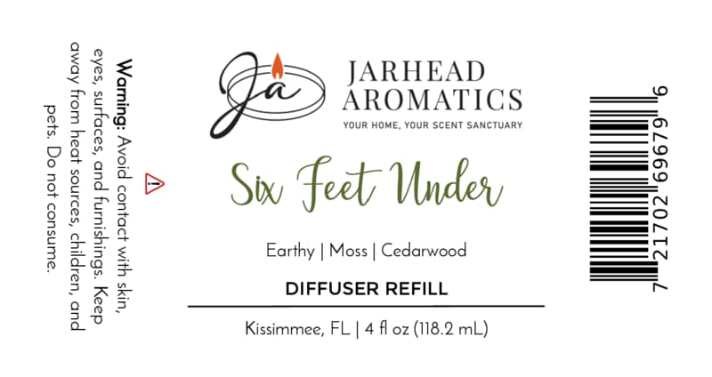 Label for Six Feet Under Diffuser Refill | Damp Earth, Moss & Ancient Oak by Jarhead Aromatics. Fragrance notes: damp earth, moss, and ancient oak—a truly earthy home scent with subtle graveyard undertones. Includes safety warnings about contact and usage. Barcode and product information displayed. 4 fl oz (118.2 mL), Kissimmee, FL.