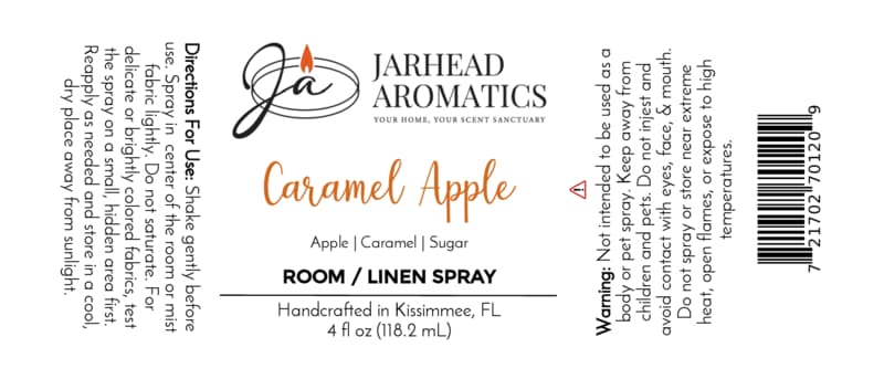 Jarhead Aromatics Caramel Apple Room & Linen Spray | Crisp Apple, Caramel & Warm Spice features a label with directions, ingredients, warnings, the Jarhead Aromatics logo, and a barcode. Handcrafted in Kissimmee, FL, this spray fills your home with a sweet fall fragrance and is available in a 4 fl oz (118.2 mL) bottle.
