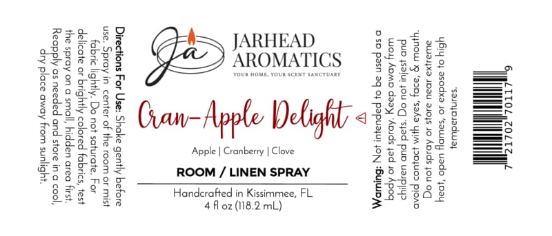 White label for Jarhead Aromatics Cran-Apple Delight Room & Linen Spray | Cranberry, Apple & Warm Cinnamon. Elevate your home fragrance experience with this inviting blend of cranberry, apple, and warm cinnamon. Label includes directions, warning, scent notes, logo, barcode, and product details. Handcrafted in Kissimmee, FL. 4 fl oz.