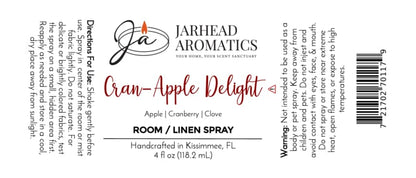 White label for Jarhead Aromatics Cran-Apple Delight Room & Linen Spray | Cranberry, Apple & Warm Cinnamon. Elevate your home fragrance experience with this inviting blend of cranberry, apple, and warm cinnamon. Label includes directions, warning, scent notes, logo, barcode, and product details. Handcrafted in Kissimmee, FL. 4 fl oz.