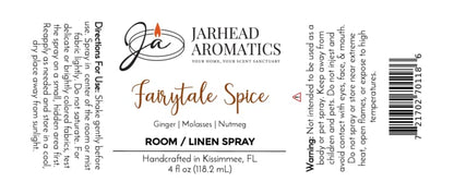 Here’s the revised sentence using your product data: A label for Jarhead Aromatics Fairytale Spice Room & Linen Spray | Gingerbread, Molasses & Warm Spice, highlighting a bakery-inspired home fragrance with notes of gingerbread, molasses, and warm spices—capturing the cozy aroma reminiscent of a gingerbread house. The label includes directions for use, safety warnings, and specifies the product size as 4 fl oz. The text is in black with orange accents.
