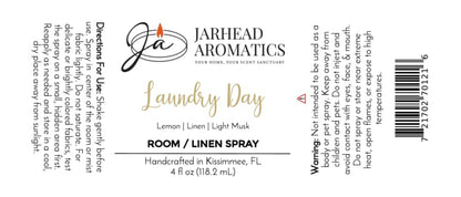 The Jarhead Aromatics Laundry Day Room & Linen Spray | Fresh Linen, Lemon & Clean Musk label showcases a crisp blend of fresh linen, zesty lemon, and clean musk notes—ideal for imparting a refreshing home fragrance. The label features usage directions, safety warnings, the Jarhead Aromatics logo, and comprehensive product details. With its white background and sophisticated black and gold typography, this spray is designed to elevate your laundry routine.
