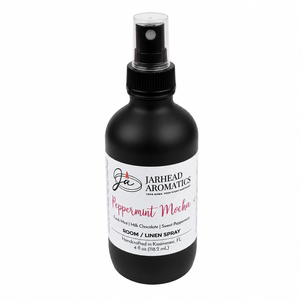 Black spray bottle with a white label reading Peppermint Mocha Room & Linen Spray | Chocolate Mint & Vanilla, listing scent notes of fresh mint, milk chocolate, and sweet peppermint for this holiday room fragrance.