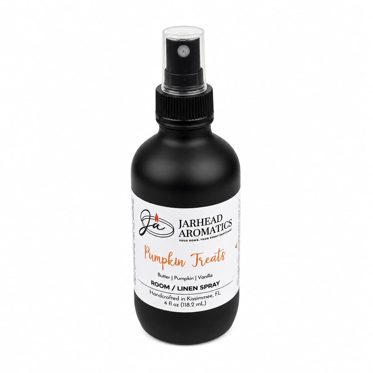 A black spray bottle labeled Jarhead Aromatics Pumpkin Treats Room & Linen Spray features an inviting fall fragrance with notes of pumpkin, caramel, and maple pecan. This 4 fl oz bottle is the perfect home fragrance, handcrafted in Kissimmee, FL.