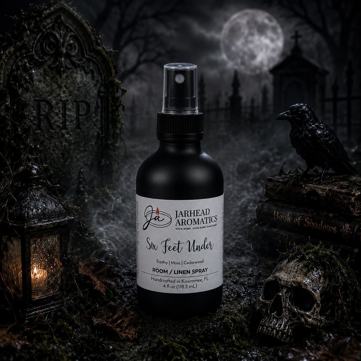 A bottle of Jarhead Aromatics Six Feet Under Room & Linen Spray | Damp Earth, Moss & Ancient Oak rests amid a shadowy graveyard tableau—tombstones, a crow, a skull, and a Book of Shadows bathed in the light of a full moon beneath drifting clouds—infusing the air with an earthy blend of damp soil, moss, and ancient oak for an eerily enchanting home fragrance.
