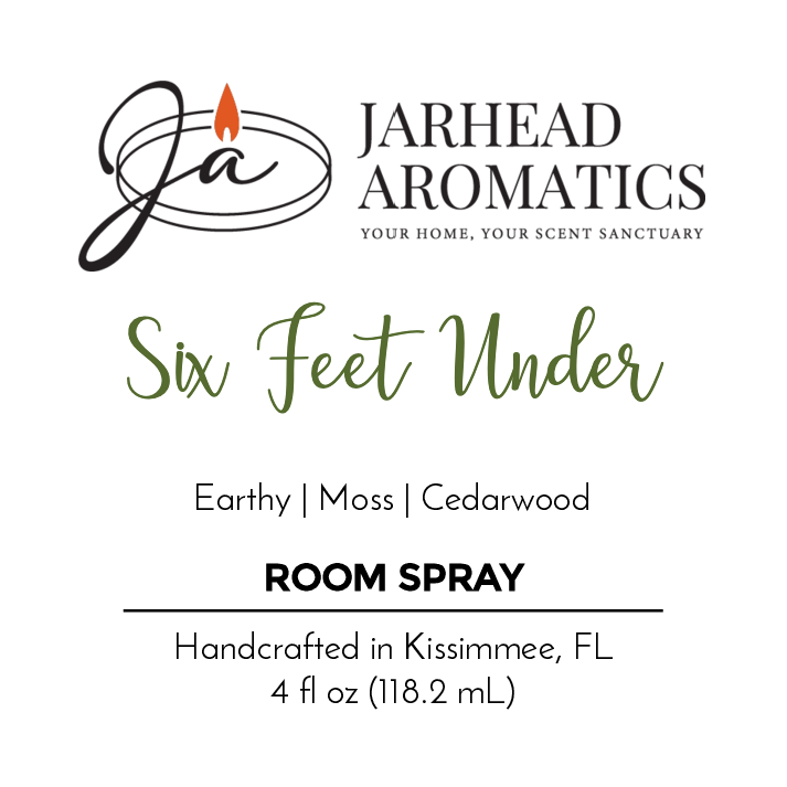Label for Jarhead Aromatics Six Feet Under Room Spray from the Halloween Collection, blending earthy moss and cedarwood with a scent of decaying leaves. Handcrafted in Kissimmee, FL. 4 fl oz (118.2 mL).