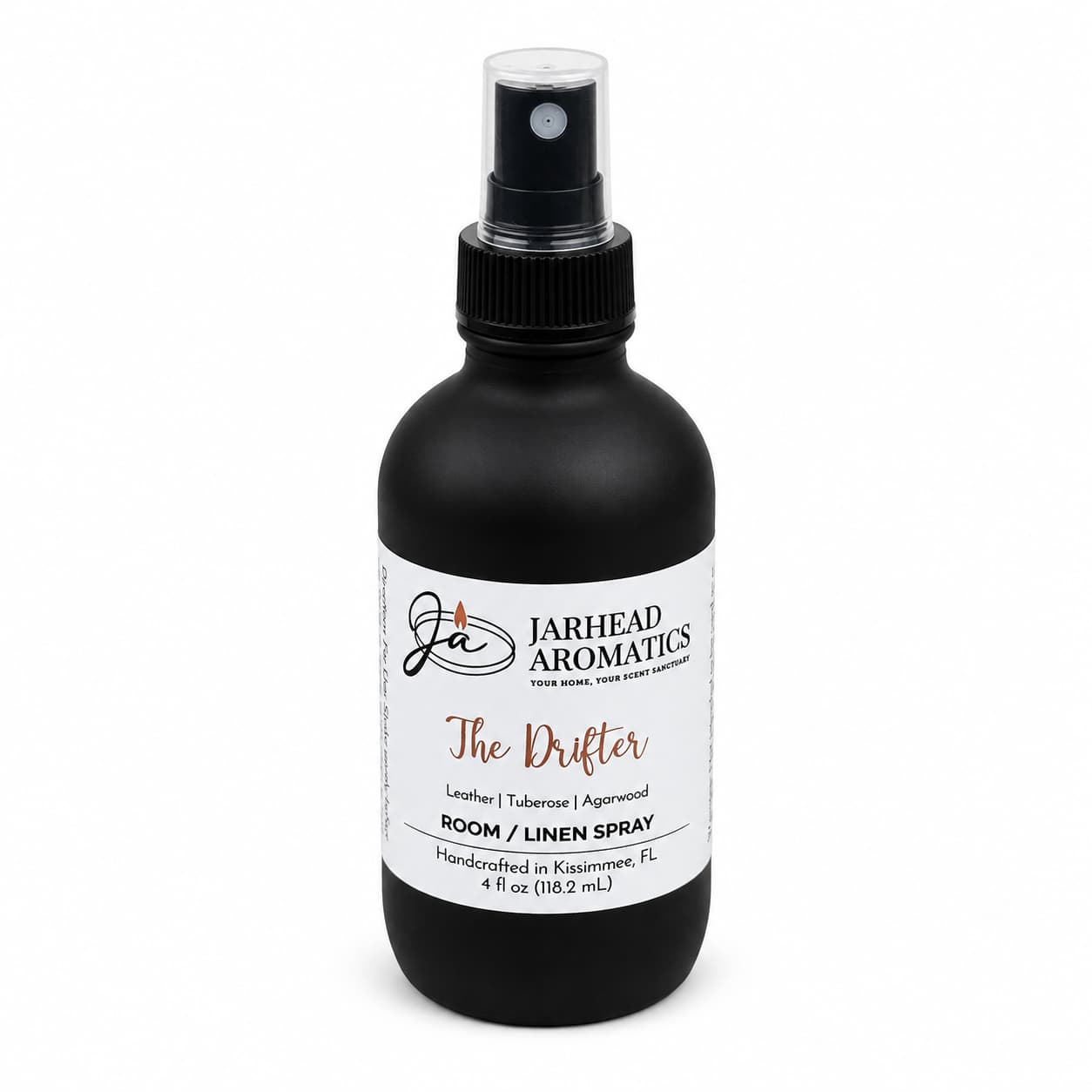 A black bottle of Jarhead Aromatics The Drifter Room & Linen Spray, featuring a spray nozzle and notes of leather, tuberose, and smoky agarwood—a western-inspired fragrance handcrafted in Kissimmee, FL.