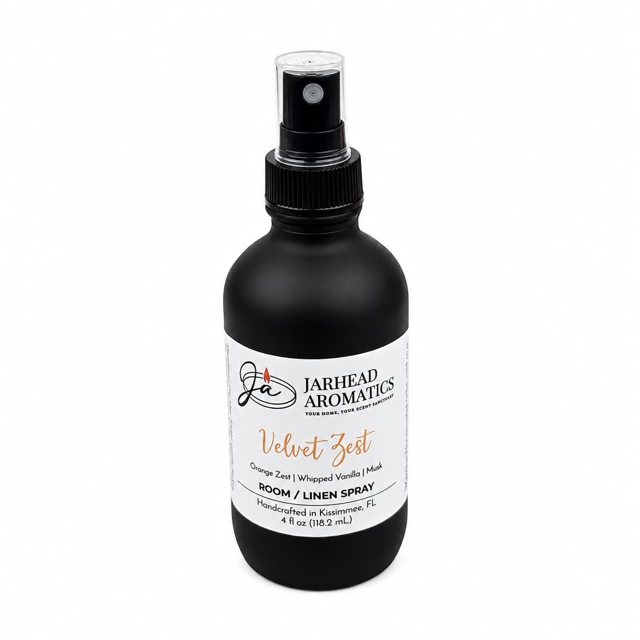 Experience the Velvet Zest Room & Linen Spray by Jarhead Aromatics—a handcrafted 4 fl oz black spray bottle from Kissimmee, FL. Infused with notes of citrus, vanilla, and brown sugar, this irresistible home fragrance refreshes any space with a delightful blend of orange zest, creamy vanilla, and subtle sweetness.