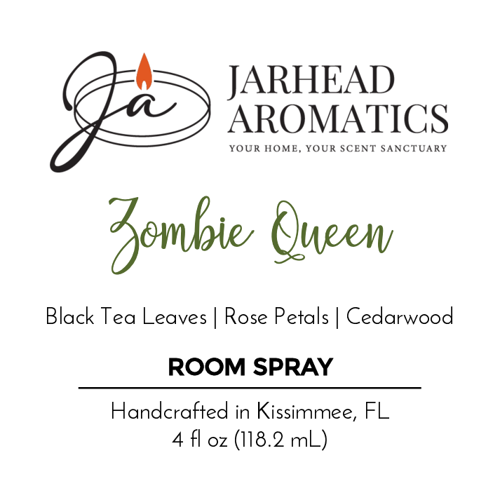Jarhead Aromatics Zombie Queen Room Spray—Halloween Collection. A gothic blend of black tea leaves, rose petals, and cedarwood. Handcrafted in Kissimmee, FL. 4 fl oz (118.2 mL). “ja” flame logo at the top.