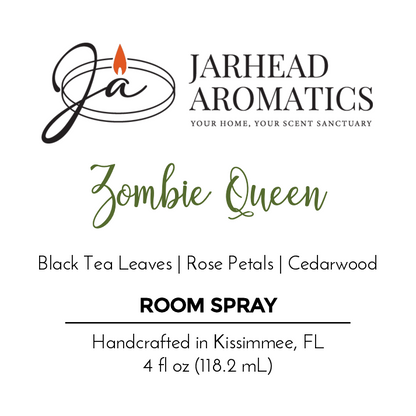 Jarhead Aromatics Zombie Queen Room Spray—Halloween Collection. A gothic blend of black tea leaves, rose petals, and cedarwood. Handcrafted in Kissimmee, FL. 4 fl oz (118.2 mL). “ja” flame logo at the top.