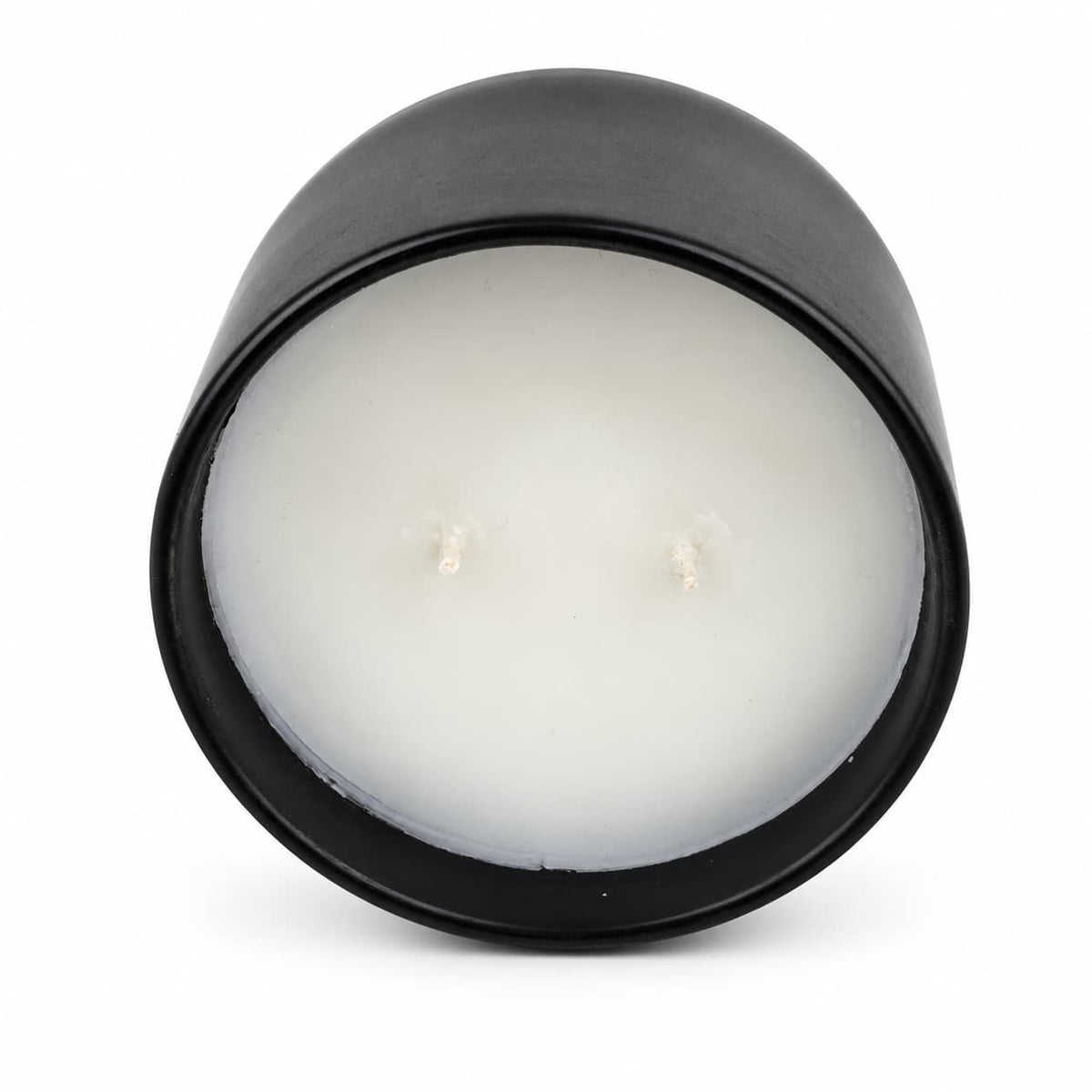 Coconut Wax Blend Candle in a black two-wick container with white wax.