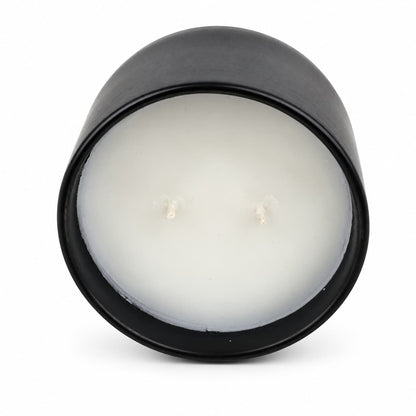 Coconut Wax Blend Candle in a black two-wick container with white wax.