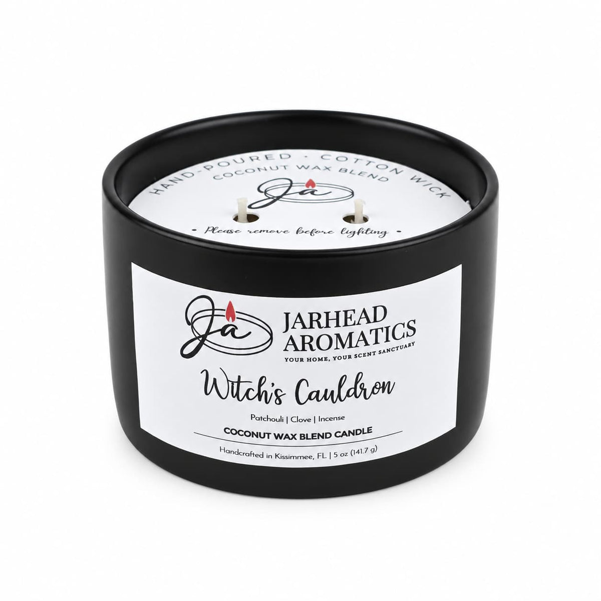 A black, two-wick Witches Cauldron Coconut Wax Blend Candle in a ceramic container, featuring patchouli, clove, and incense notes in a coconut wax blend.