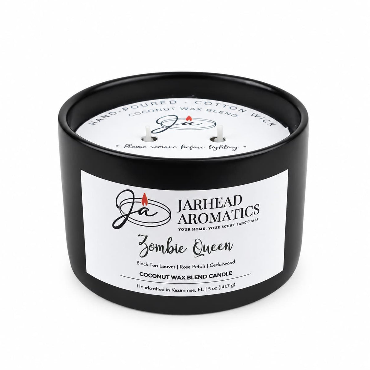 Black Zombie Queen Coconut Wax Blend Candle in a tin with two wicks and an interior label reading hand-poured coconut wax blend.