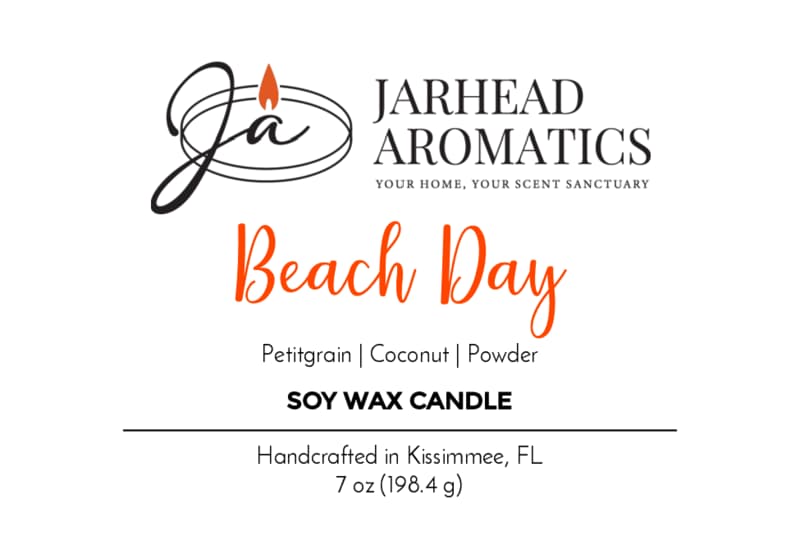 Label for Jarhead Aromatics’ Beach Day Soy Wax Candle | Coconut, Citrus & Coastal Breeze Candle—crafted in Kissimmee, FL, and infused with a refreshing coastal fragrance featuring petitgrain, coconut, and powder notes. Enjoy a long-lasting scent with black and orange text on a clean white background.