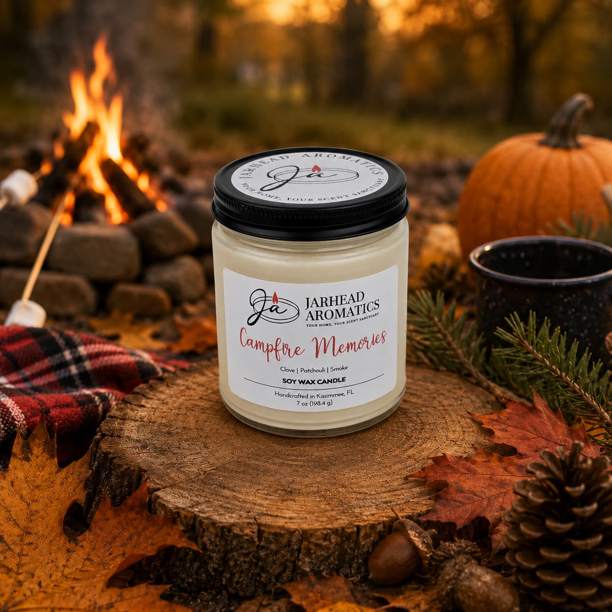 A Jarhead Aromatics Campfire Memories Soy Wax Candle—featuring notes of smoky embers, maple, moss, and patchouli—rests on a tree stump surrounded by autumn leaves, pinecones, a pumpkin, and a mug, with marshmallows roasting by the campfire in the background. This fall candle perfectly captures the warmth and nostalgia of autumn nights.