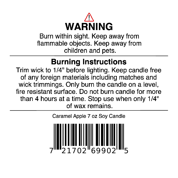 Here is the revised sentence using your product data: White label featuring safety precautions, burning instructions, and wick trimming advice for the Jarhead Aromatics Caramel Apple Soy Wax Candle (Apple Cider, Caramel & Sugar Candle), with a barcode at the bottom.