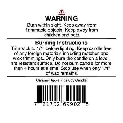 Here is the revised sentence using your product data: White label featuring safety precautions, burning instructions, and wick trimming advice for the Jarhead Aromatics Caramel Apple Soy Wax Candle (Apple Cider, Caramel & Sugar Candle), with a barcode at the bottom.