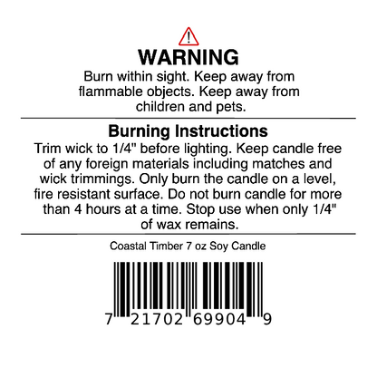Candle warning label with safety and burning instructions, barcode, and product name Coastal Timber Soy Wax Candle | Teakwood, Leather & Amber Candle by Jarhead Aromatics on a white background. This masculine candle features a woodsy blend of teakwood, leather, and amber—perfect for adding rugged elegance to any space.