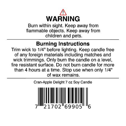 Label for a Jarhead Aromatics Cran-Apple Delight Soy Wax Candle (Cranberry, Apple & Cinnamon) 7 oz—includes warning and burning instructions, barcode, guidance on wick trimming, safe use, and reminders to keep away from children, pets, and flammable items. Enjoy the long-lasting scent of our Cran-Apple Delight Soy Wax Candle by Jarhead Aromatics—crafted for safety and inviting freshness with every burn.