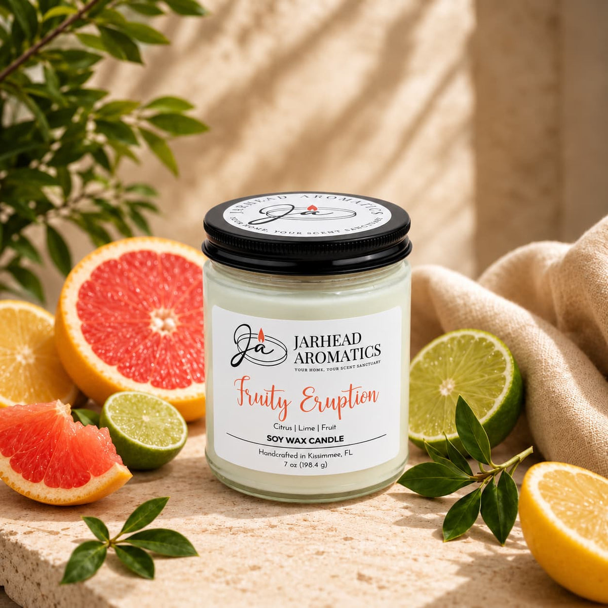 A Fruity Eruption Soy Wax Candle surrounded by sliced grapefruit, lime, and lemon.
