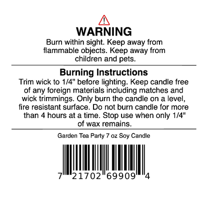 Candle warning label with safety instructions, burning directions, and barcode. Text advises trimming the wick, keeping away from flammable objects, and only burning your Jarhead Aromatics Garden Tea Party Soy Wax Candle | Rose, Jasmine & Green Floral Candle on a level, fire-resistant surface. Perfect for use with your floral scented candle or any hand-poured soy candle.