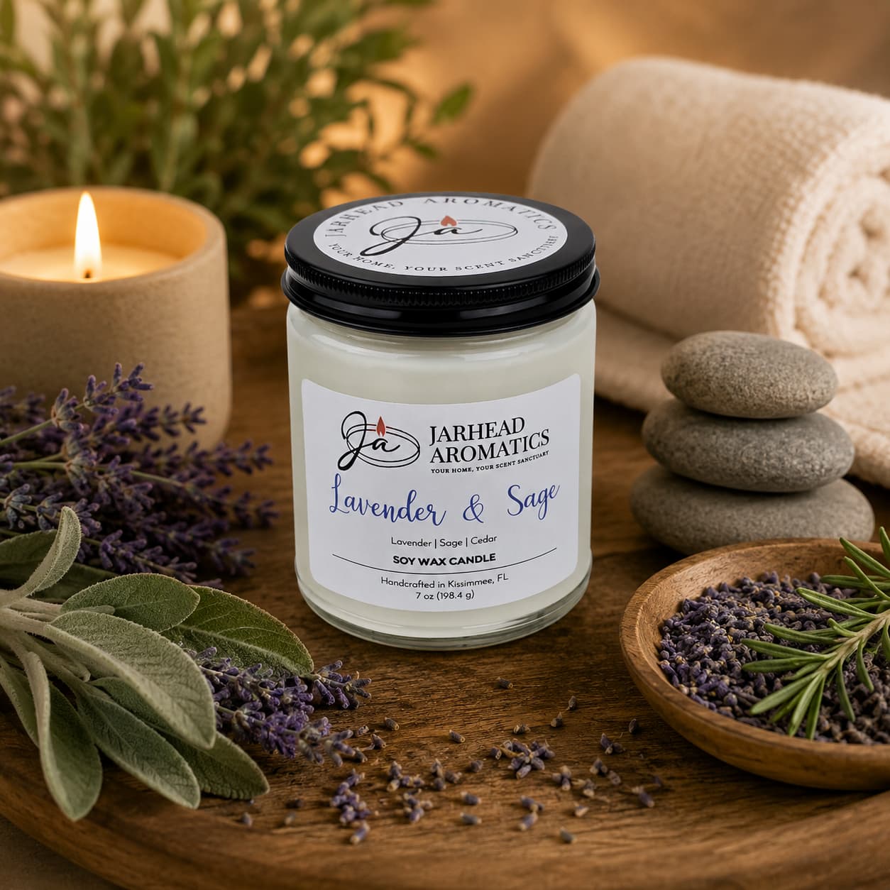 The Lavender & Sage Soy Wax Candle by Jarhead Aromatics, featuring relaxing lavender, sage & sandalwood scents, sits on a wooden tray with fresh herbs and spa decor, creating a calming and soothing atmosphere.