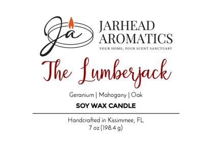 Product label for Jarhead Aromatics’ The Lumberjack Soy Wax Candle, a masculine blend of cedar, oak, and mahogany. Handcrafted in Kissimmee, FL. Net wt 7 oz (198.4 g). Logo features a stylized flame.