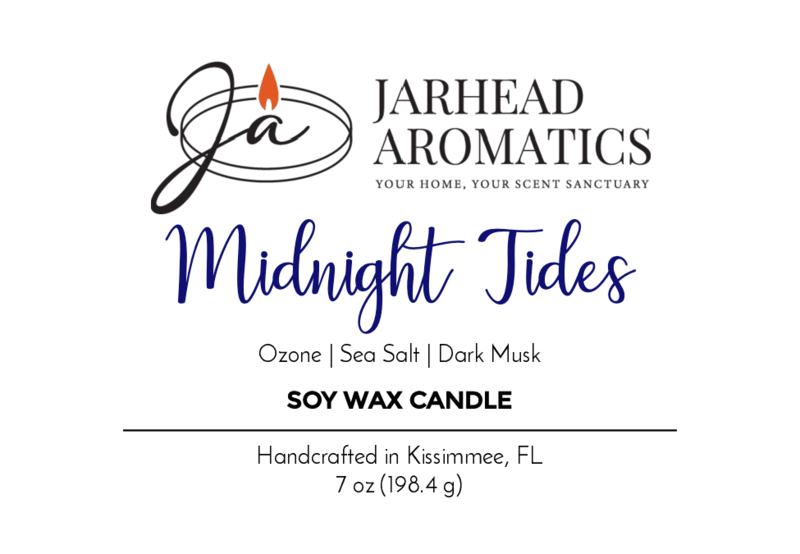 The Jarhead Aromatics Midnight Tides Soy Wax Candle label features a flame logo and notes a clean scent of ozone, sea salt, and dark musk. It reads: Handcrafted in Kissimmee, FL, 7 oz (198.4 g).