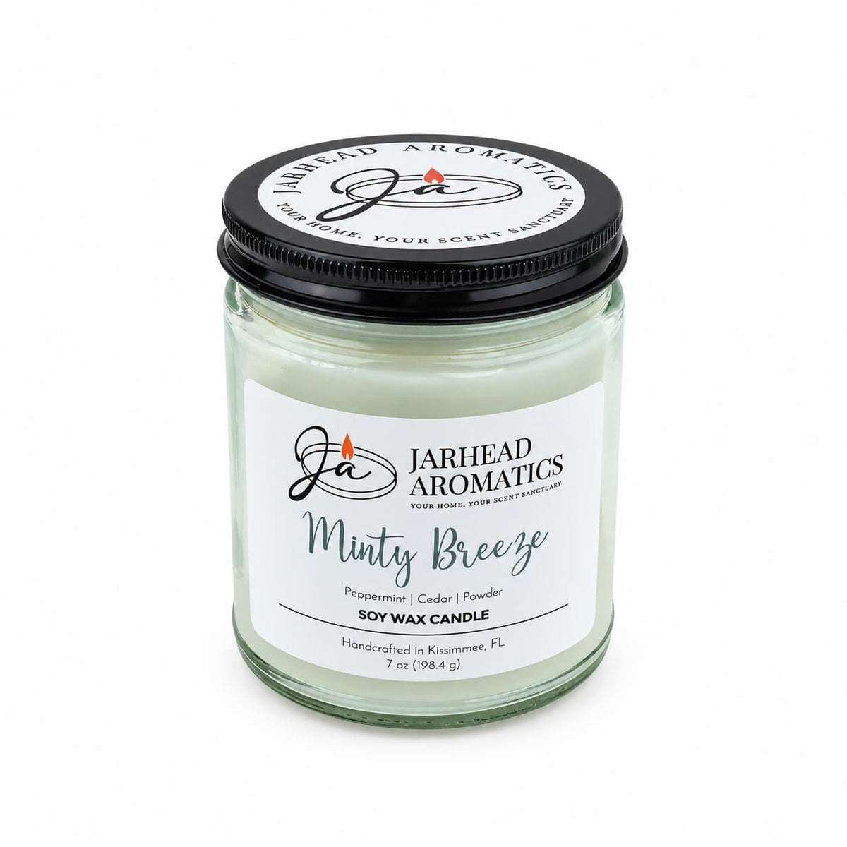 Jarhead Aromatics Minty Breeze Soy Wax Candle in a glass jar with a black lid and a white label, featuring peppermint, cedar, and powder scent notes perfect for spa aromatherapy.