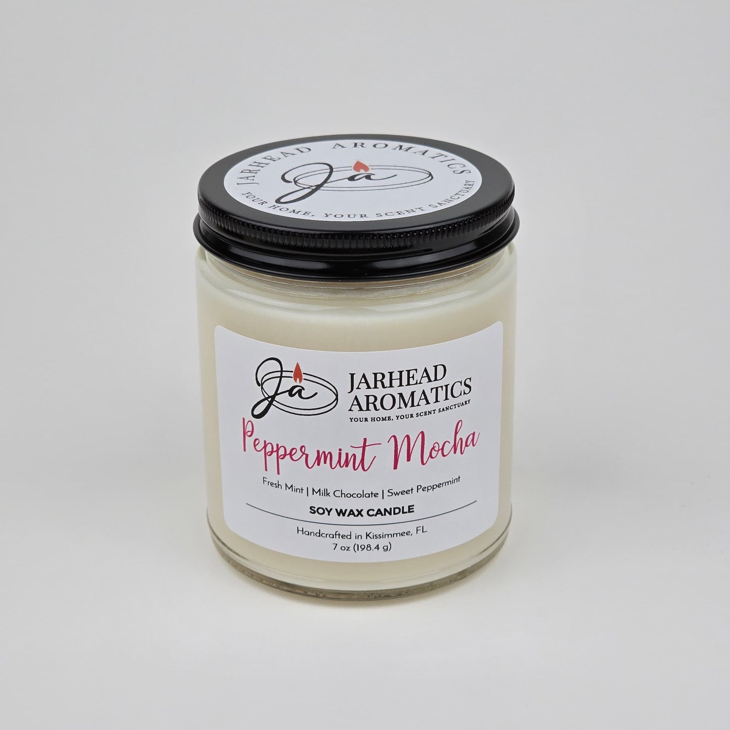 Introducing the Peppermint Mocha Soy Wax Candle | Chocolate Mint & Vanilla Holiday Candle by Jarhead Aromatics, featuring scent notes of fresh mint, milk chocolate, and sweet peppermint. This hand-poured soy wax candle fills your space with a festive chocolate peppermint aroma—perfect for the holiday season.