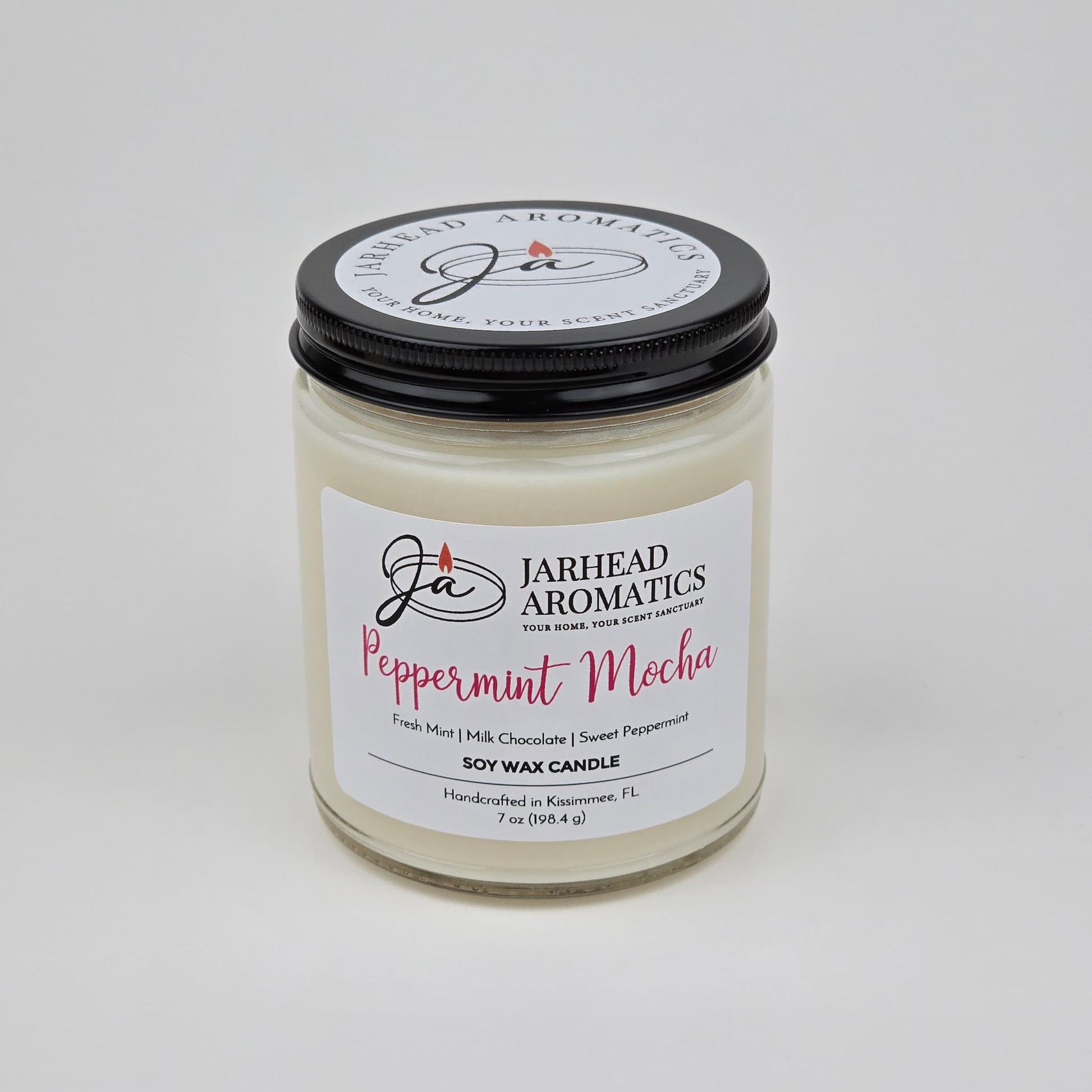Introducing the Peppermint Mocha Soy Wax Candle | Chocolate Mint & Vanilla Holiday Candle by Jarhead Aromatics, featuring scent notes of fresh mint, milk chocolate, and sweet peppermint. This hand-poured soy wax candle fills your space with a festive chocolate peppermint aroma—perfect for the holiday season.