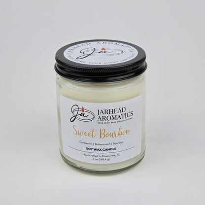 Handcrafted in Kissimmee, FL, the Sweet Bourbon Soy Wax Candle by Jarhead Aromatics fills your space with warm notes of bourbon, brown sugar, and oak. This 7 oz clear glass jar candle is hand-poured and designed to offer a long-lasting scent, making it a perfect addition to any room.