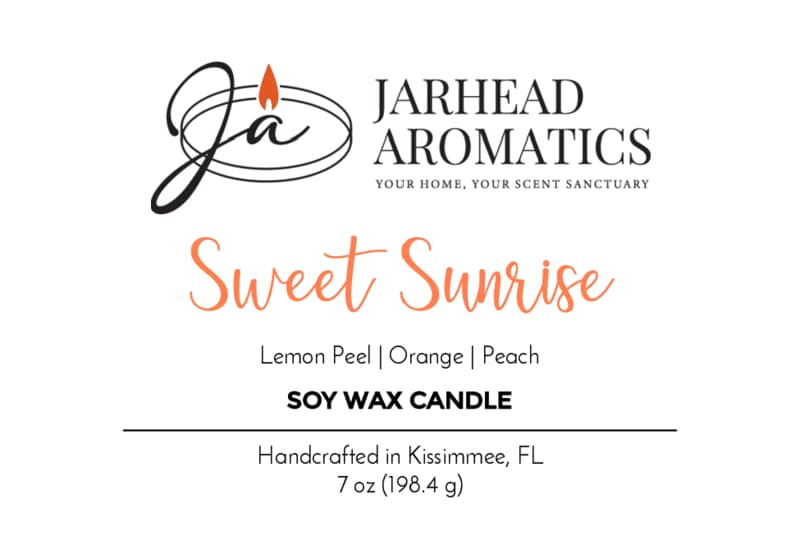 Jarhead Aromatics Sweet Sunrise Soy Wax Candle label showcases a bright citrus, agave, and peach candle blend with notes of lemon peel, orange, and peach. Handcrafted in Kissimmee, FL. 7 oz (198.4 g). Black, orange, and gray text on a white background.