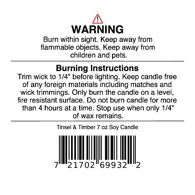 Jarhead Aromatics Tinsel & Timber Soy Wax Candle | Eucalyptus, Pine, Smoke & Tonka Holiday Candle – 7 oz candle warning label featuring safety instructions, burning guidelines (like trimming the wick and not burning your soy wax candle for more than 4 hours), and a barcode. Perfect for all your holiday fragrance needs.