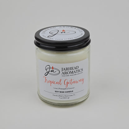 The Jarhead Aromatics Tropical Getaway Soy Wax Candle features mango, coconut, and pineapple scents in a 7 oz handcrafted candle made in Kissimmee, FL—ideal for an authentic tropical fragrance experience.