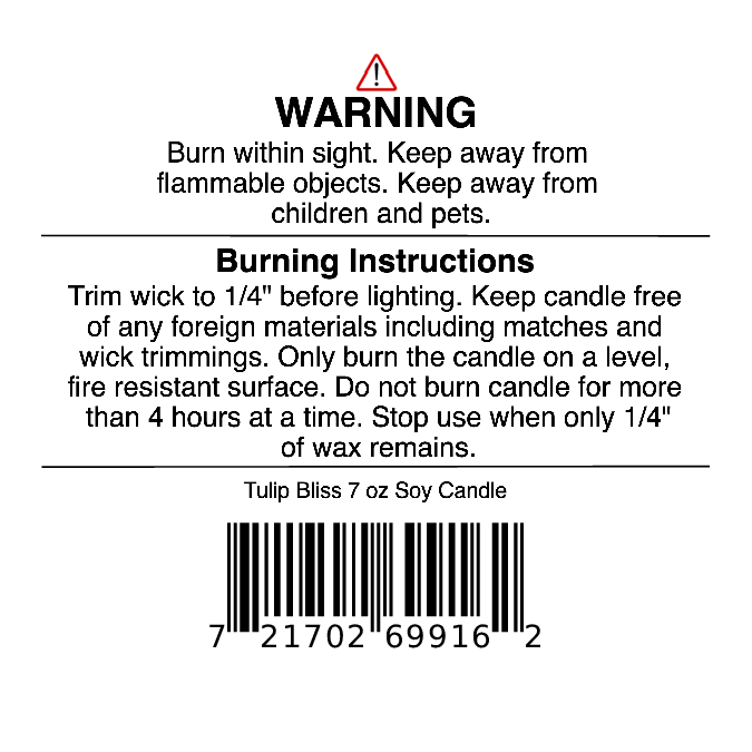 Label displaying a warning and burning instructions for the Tulip Bliss Soy Wax Candle | Peach, Tulip & Soft Musk Candle by Jarhead Aromatics, including guidance to trim the wick and keep away from flammable objects and pets. This floral-scented candle also features a barcode at the bottom.