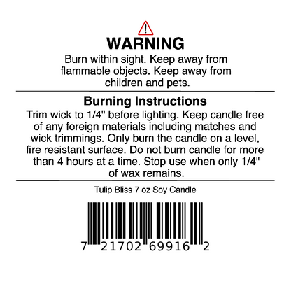 Label displaying a warning and burning instructions for the Tulip Bliss Soy Wax Candle | Peach, Tulip & Soft Musk Candle by Jarhead Aromatics, including guidance to trim the wick and keep away from flammable objects and pets. This floral-scented candle also features a barcode at the bottom.