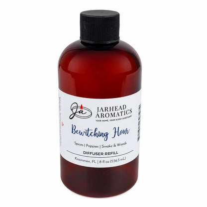 A brown plastic bottle with a black cap contains 8 fl oz (236.5 mL) of Jarhead Aromatics’ Bewitching Hour Diffuser Refill, a home fragrance infused with gothic elegance and featuring scent notes of exotic spices, dark florals, and smoky woods.