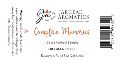 A label for the Campfire Memories Diffuser Refill by Jarhead Aromatics, featuring maple, clove, and smoky embers—a cozy home fragrance that captures an inviting autumn scent. Warning text, barcode, and product details such as volume and location are included.