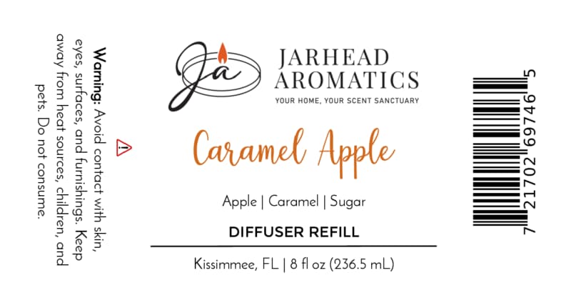 Jarhead Aromatics Caramel Apple Diffuser Refill | Crisp Apple, Rich Caramel & Warm Spice 8 fl oz label features a warning to avoid contact and keep away from heat, children, and pets, along with a barcode and ingredients list: apple, caramel, sugar. This gourmand fragrance creates an inviting home fragrance experience.