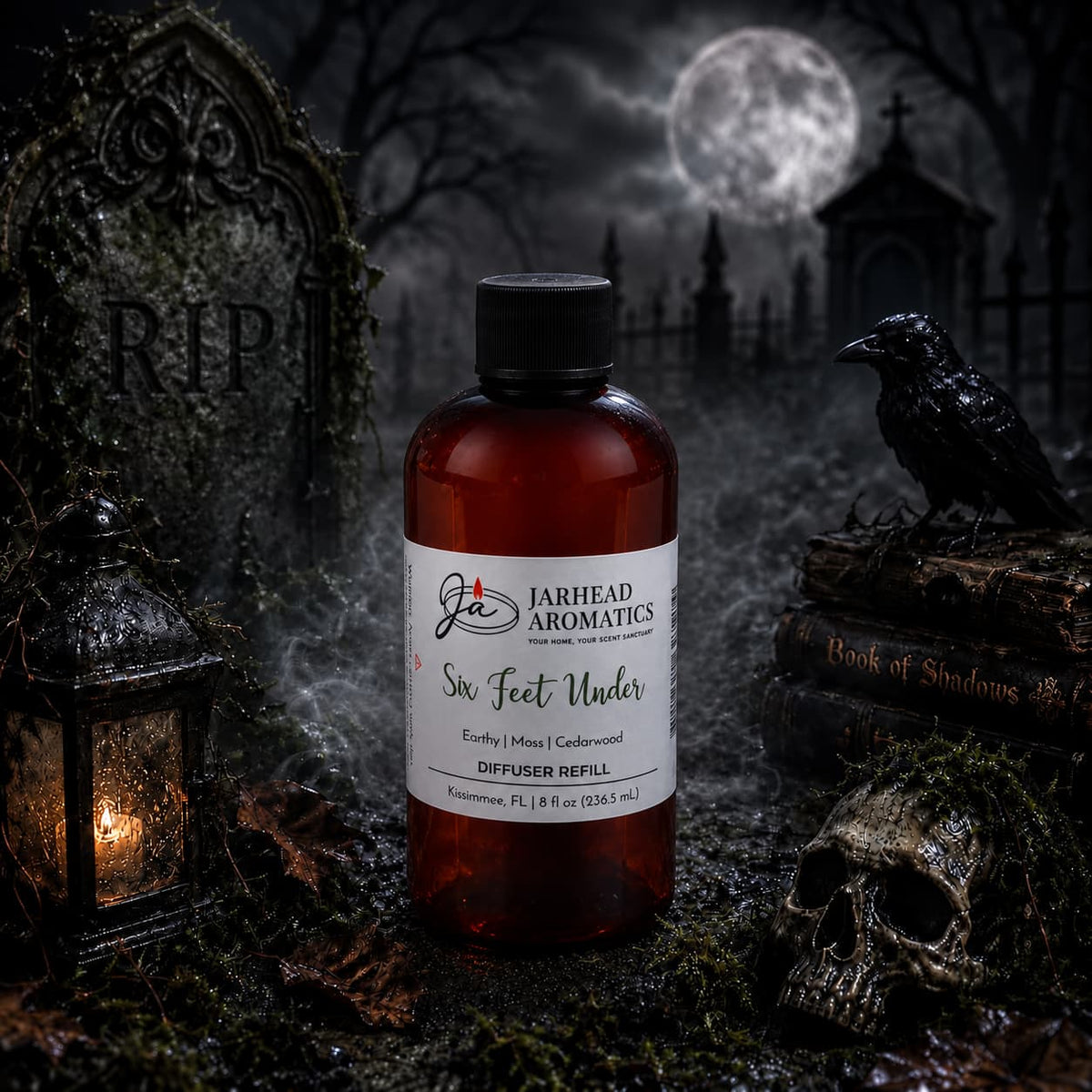 A bottle of Jarhead Aromatics’ Six Feet Under Diffuser Refill | Damp Earth, Moss & Ancient Oak rests atop a stone surrounded by a skull, crow, lantern, and Book of Shadows; its earthy aroma weaves through the moonlit cemetery adorned with gravestones and framed by a wrought iron gate, setting an unforgettable home fragrance mood.