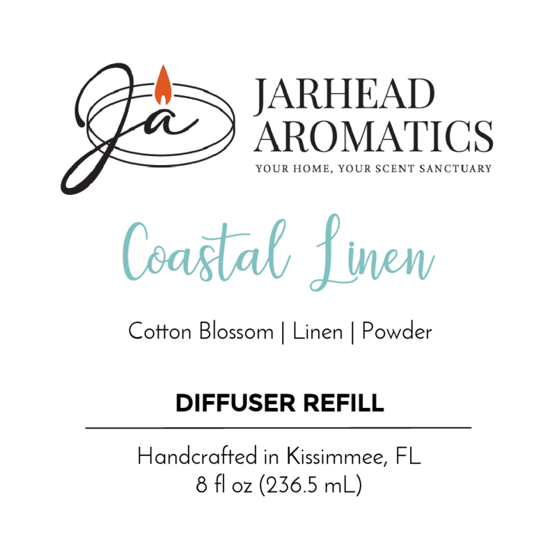 Jarhead Aromatics Coastal Linen Diffuser Refill—8 fl oz (236.5 mL). Handcrafted in Kissimmee, FL with premium fragrance oil. Notes of cotton blossom, linen, and powder. Your coastal retreat in a bottle. Lit candle logo on label.