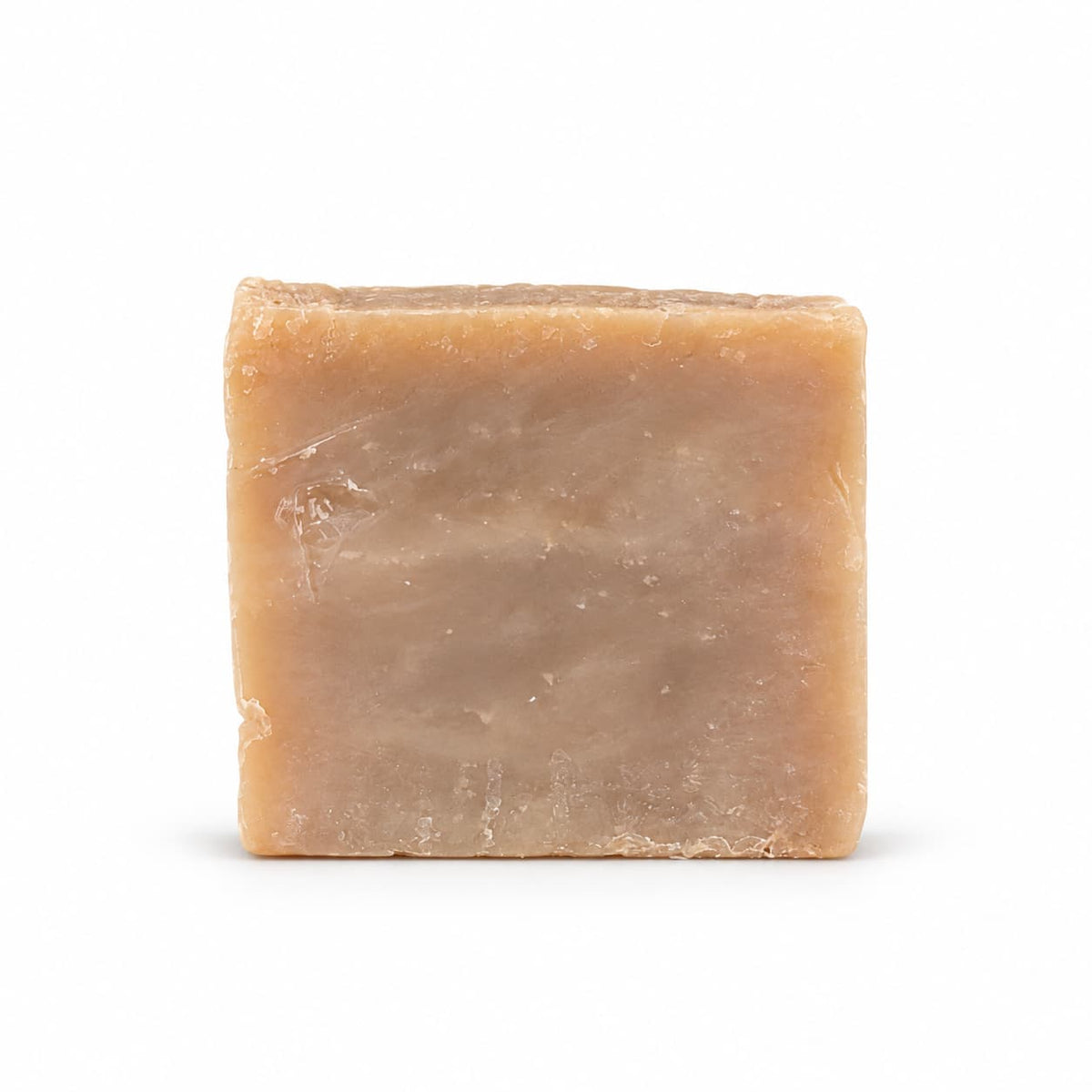 A square bar of Almond + Lemon Natural Handmade Soap | Turmeric & Shea Butter Bar Soap by Jarhead Aromatics.