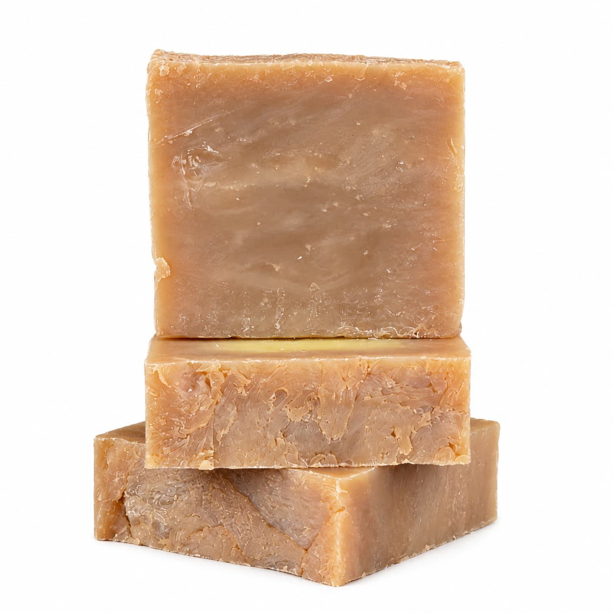 Three stacked rectangular bars of Almond + Lemon Natural Handmade Soap | Turmeric & Shea Butter Bar Soap by Jarhead Aromatics.